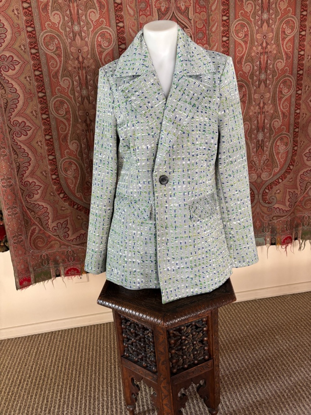 cabi blazer with blue and green flecks.
Has very good stretch for easy movement.
